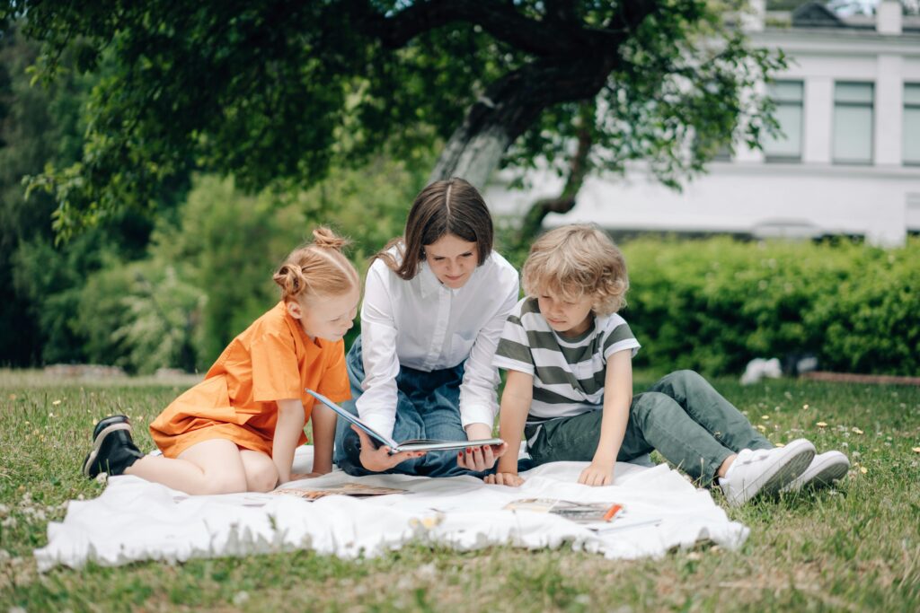 Reading books as a family with different aged children